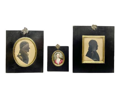 Two 19th century silhouettes, the first example depicting the side profile of Thomas Smallwood, with details highlighted in g