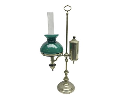 William H Honey polished brass adjustable student's oil lamp, with green glass shade, H60cm