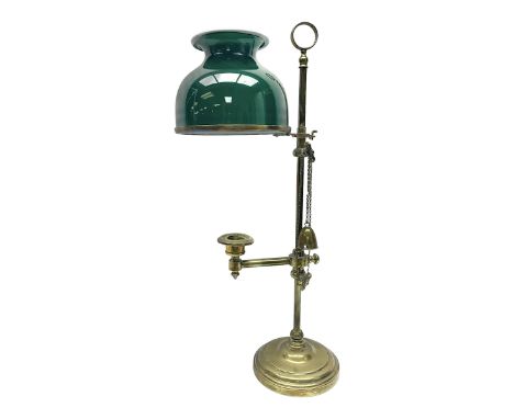 19th century brass Bouillotte candle lamp with adjustable green glass shade, with a circular base and snuffer, H48cm