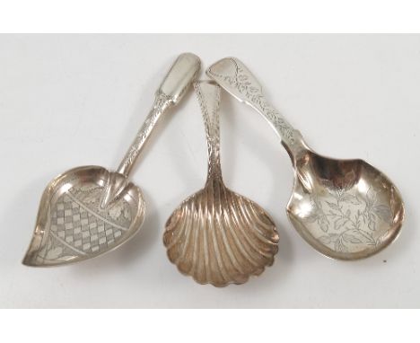 A Georgian silver caddy spoon, with shell bowl and bright cut decoration to the handle, London 1821, maker John Lambe, togeth