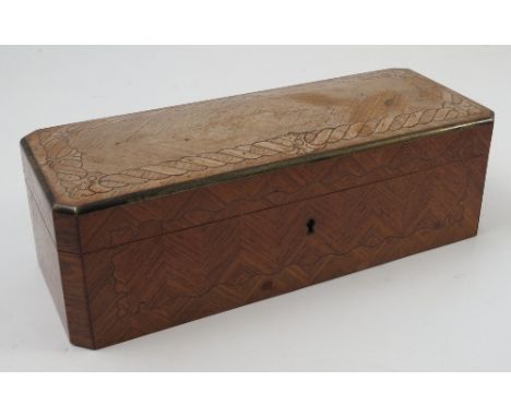 A 19th century Kingwood glove box, of rectangular form with canted corners, having inlaid brass to the top and sides, with hi