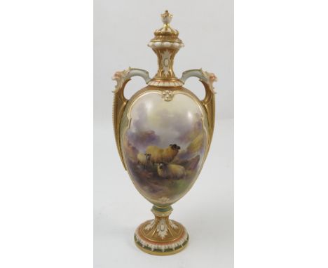 A Royal Worcester covered pedestal vase, hand painted to the front with three sheep in a landscape by Harry Davis, with gilt 