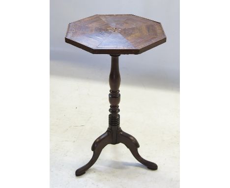 A 19th century wine table, with octagonal rosewood cross banded and inlaid top, raised on turned column terminating in tripod