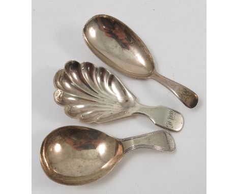 A Georgian silver caddy spoon, with shell bowl, the fiddle handle engraved with initials, London 1834, together with another 