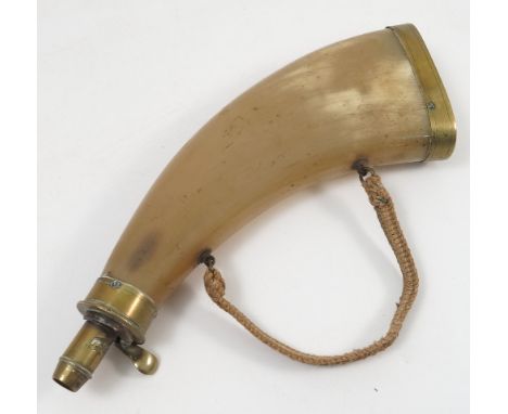 A 19th century powder flask, the horn flask with brass mounts, length 10.5ins