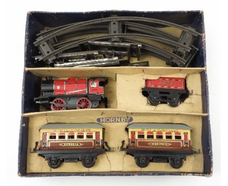 A boxed Hornby Train 0 gauge clockwork tin plate set, M1, engine, tender, two Pullman carriages and track