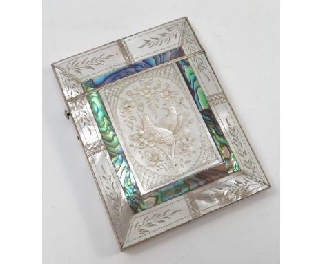 A Victorian mother of pearl rectangular card case, the one side with large rectangular panel embossed with two birds and flow