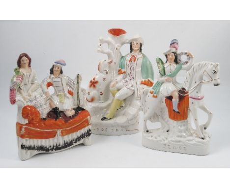 Three 19th century Staffordshire pottery figures, Peace, figure on horseback, Dog Tray, figure and dog seated by a tree and a