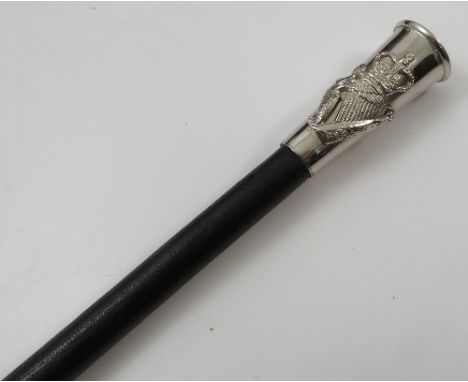 A Royal Irish military swagger stick, with silver plated mounts and leather covered shaft, length 24.5ins