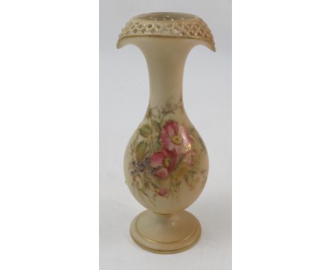 A Royal Worcester blush ivory vase, with pierced shaped opening, to a baluster body, raised on a circular pedestal foot, deco