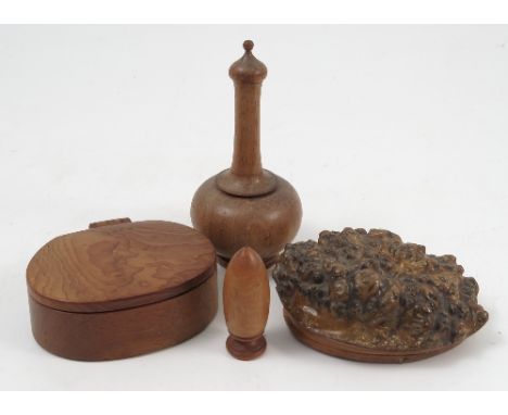 Five carved treen items, to include a 19th century snuff box formed from a piece of burr maple, a pounce pot with screw off c