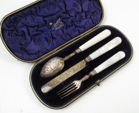 A cased silver three piece christening set, comprising knife, spoon and fork, with engraved blades and mother of pearl handle