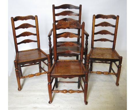 A set of 5 (4+1) ladder back oak chairs, with solid seats, raised on turned legs united by front stretchers