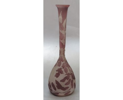 A Galle amethyst glass vase, with bulbous body and tall slender neck, decorated with leaves and flowers, height 10.75ins