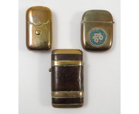 A brass and leather covered vesta case, with brass bands, together with another brass vesta case with circular micro mosaic f