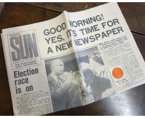 A first edition copy of The Sun newspaper