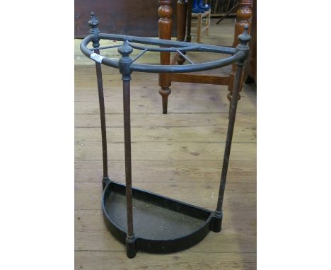A semi-circular copper and brass stick stand, width 16.5ins 