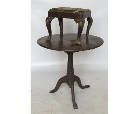A late Georgian oak circular tripod table, diameter 29.5ins, and a Georgian design stool 