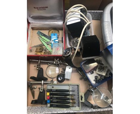 BOX OF WATCH MAKERS TOOLS, TWEEZERS, CLAMPS WITH MAGNIFYING GLASSES, WATCH/CLOCK KEYS, WORKBENCH LAMP, LOUPE