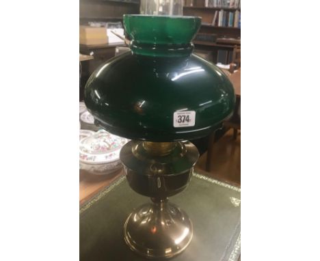 BRASS OIL LAMP WITH GREEN GLASS SHADE