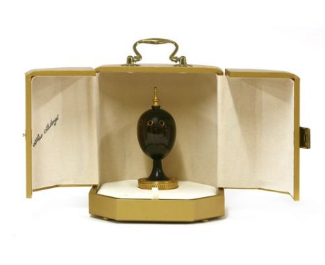 A Theo Fabergé cocobolo wood 'Scribe' egg, 1985, the central shaft fitted with a pencil, 24 carat mounted, signed to the plin
