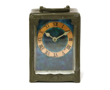 A Liberty &amp; Co. pewter and enamel desk clock, designed by Archibald Knox, model no. 0721, the copper dial with Roman nume