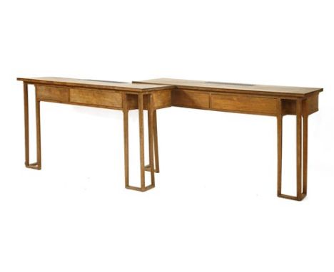 A pair of Arts and Crafts laurel wood console tables, designed by Montagu C Norman for Thorpe Lodge and made by J H Wakelin a