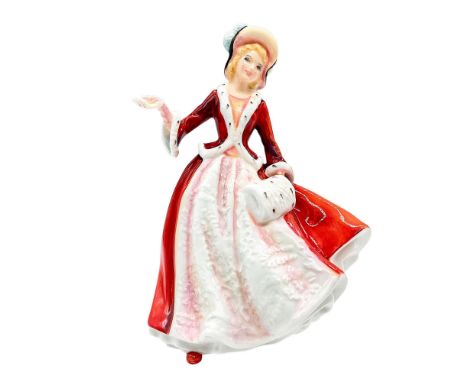 Bone china figure wearing red dress with relief pattern, matching overcoat with fur lining, and a multicolored feathered hat.
