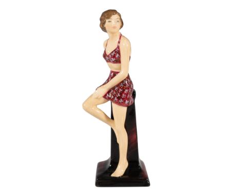 Rare Art Deco beautify in a red floral bikini, leaning on a black pillar. Royal Doulton backstamp. Dimensions: 2.75"L x 2.25"
