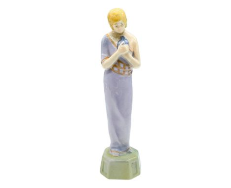 In style of Phoebe Stabler. Figure of a lady depicted as Spring in a lavender dress, and cradling a blue bird. Royal Doulton 