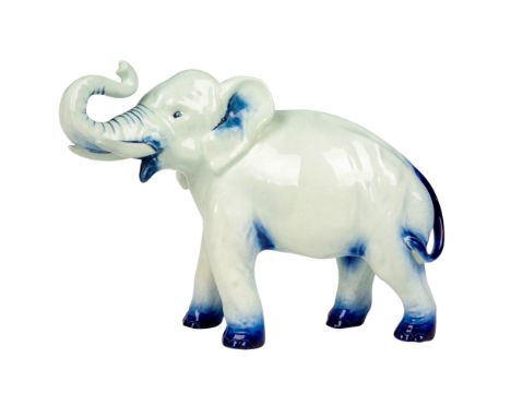 Very rare elephant with trunk in salute, designed by Charles Noke. Royal Doulton backstamp. Artist: Charles NokeIssued: 193Di