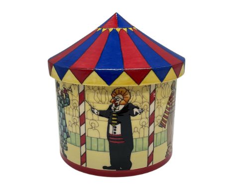 Limited edition multicolor ceramic covered jar depicted as circus big top tent with various clowns performing for a large aud