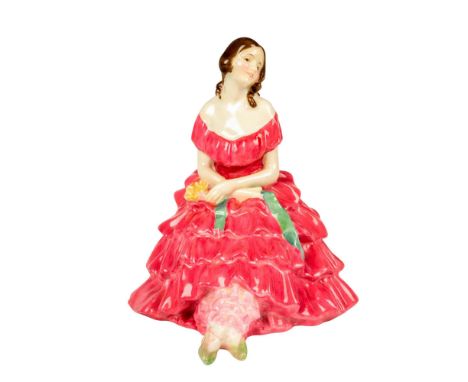 Very rare version; Glaze finish modeled as a pretty lady sitting, holding flowers in pink red gown with a green ribbon sash a