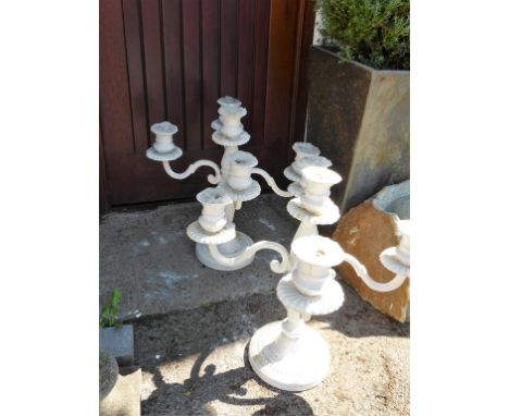 A pair of five branch white painted cast metal garden candelabra (2)