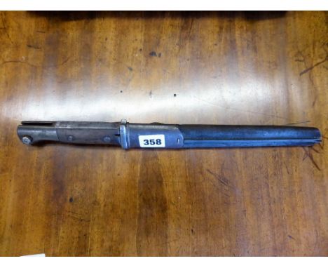 A WWI German bayonet with non standard scabbard.
