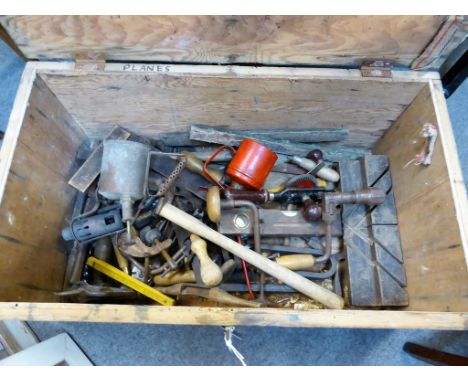 A large collection of various vintage/antique tools contained in painted wooden chest.