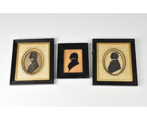 Three framed Edwardian portrait silhouettes two highlighted in gold, one signed 'adolphe'. (3)
