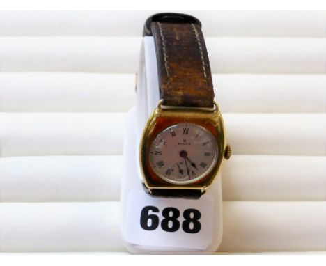 A Rolex cushion cased 9ct gold gentleman's manual wrist watch1930s, the circular 21mm. silvered dial signed 'Rolex', with bla