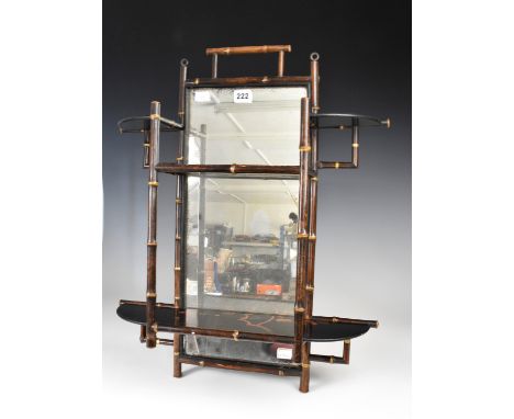 A Japanese style lacquered mirror-back hanging wall shelf