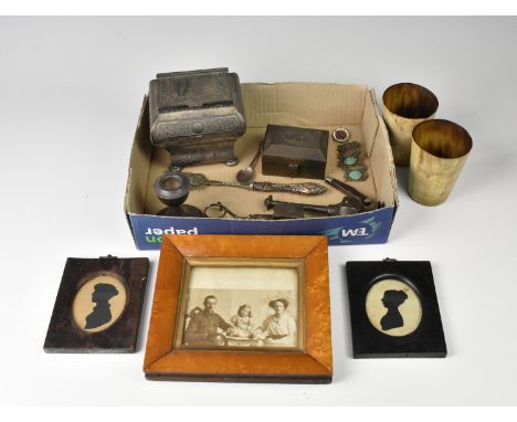 A silver dwarf candlestick, two 19th C silhouettes, pair of horn beakers, bird's eye maple frame, EPBM tea caddy etc.