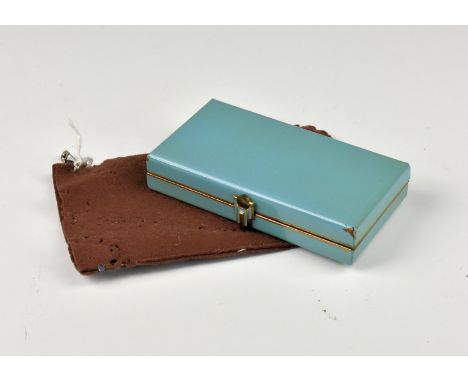 An Art Deco enamel combination powder compactthe lid opening to reveal two powder compartments; mirror, the mirror hinges ope