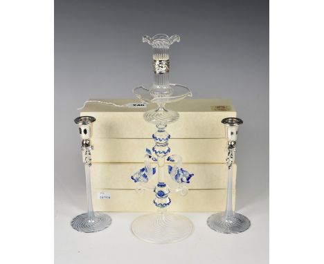 A pair of silver mounted blown glass candlesticks by Medusa, Italy 8¼in. (21cm.) high, boxed; together with a Murano blue and