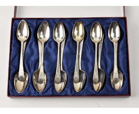 Two sets of six George III silver bright cut teaspoons the first by Thomas Northcote, London 1784, with engraved initials MN 