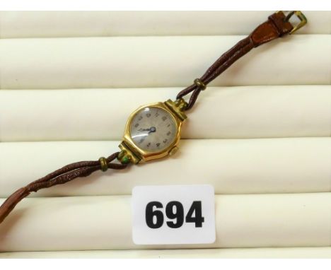 A 9ct gold cased ladies manual wristwatch hallmarked with London import marks, 1924, Swiss 15 jewel movement, later leather s