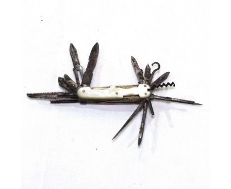 An early 20th century miniature mother-of-pearl and steel multi-tool penknife, with 18 various blades and tools, length 6cm 