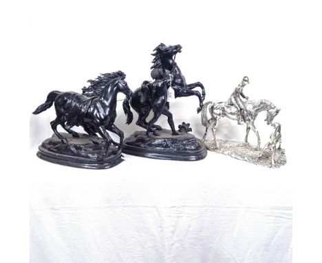 A silver plated hunting sculpture, and a pair of Marley horse groups, largest height 35cm (3) 