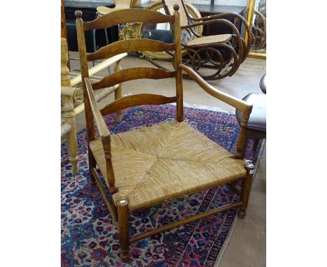 A ladder-back lounge chair with rush seat 