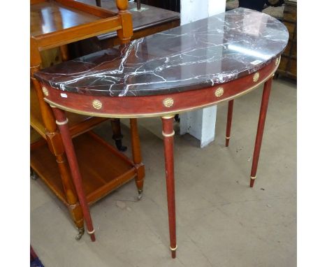 A red marble-top demi-lune console table, on a painted and gilded base, with turned legs, W108cm, H86cm 