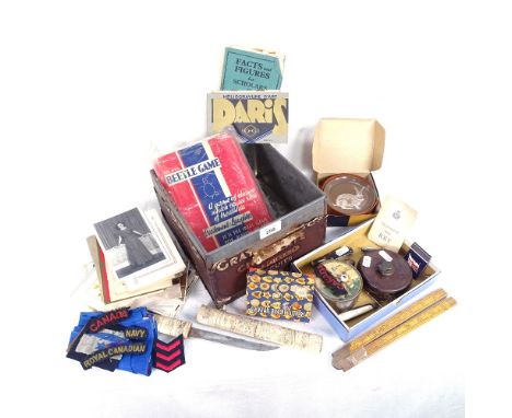 A leather-cased tape, penknives, a musical box, an Eastern knife in a carved bone scabbard etc 