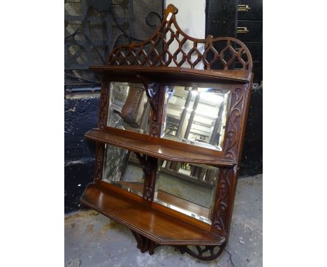 A Chippendale design mahogany 3-tier hanging mirror-back shelf 